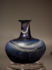 Early Roman marbled blue and white glass flask