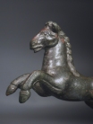 Roman bronze galloping horse.