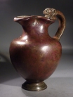 Roman bronze oinochoe with panther handle.