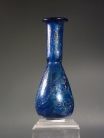 Early Roman cobalt blue glass unguentarium (cosmetic flask).
