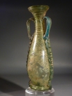 Roman greenish yellow glass amphora with turquoise-green glass twin handles.